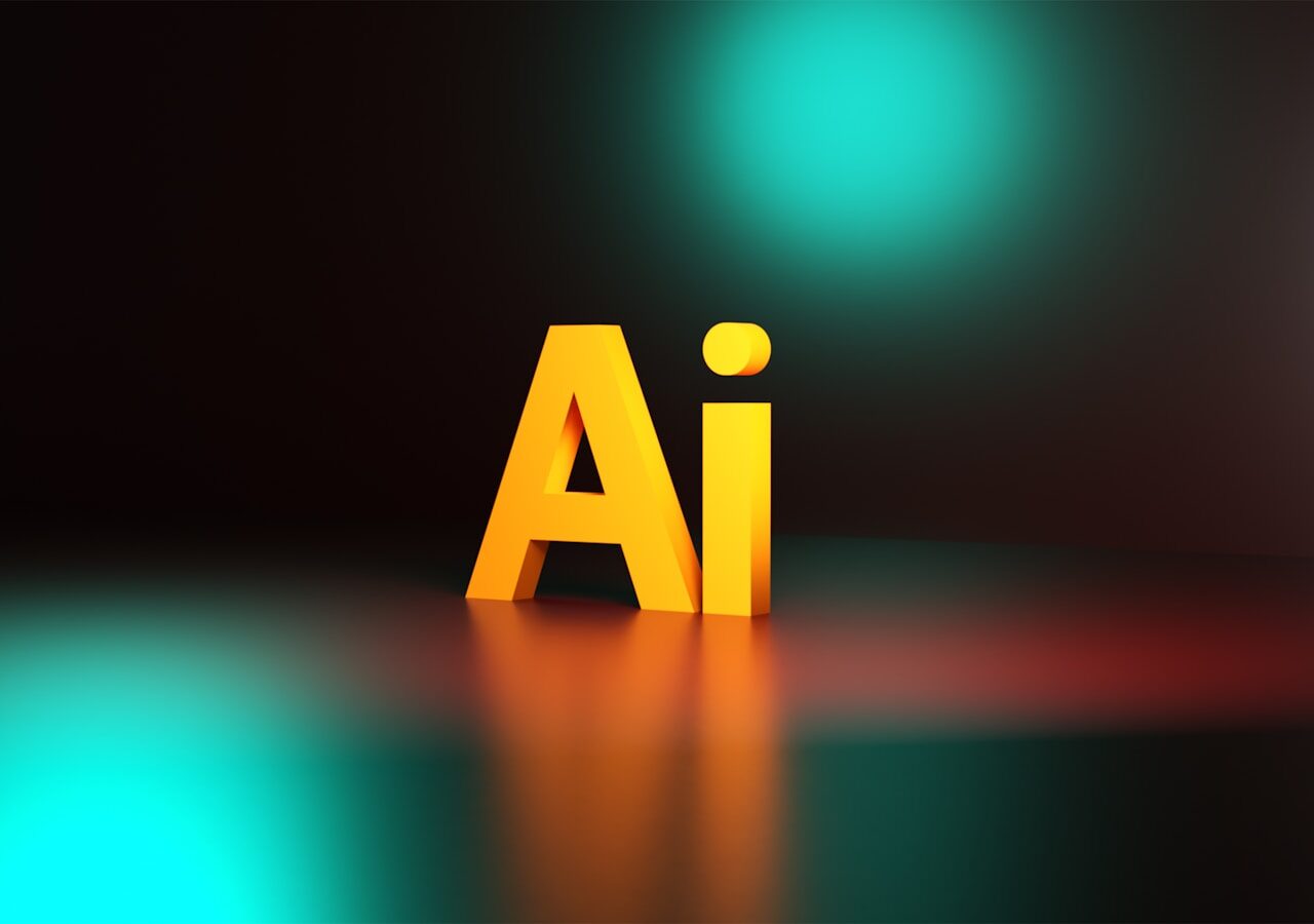 a yellow letter sitting on top of a black floor