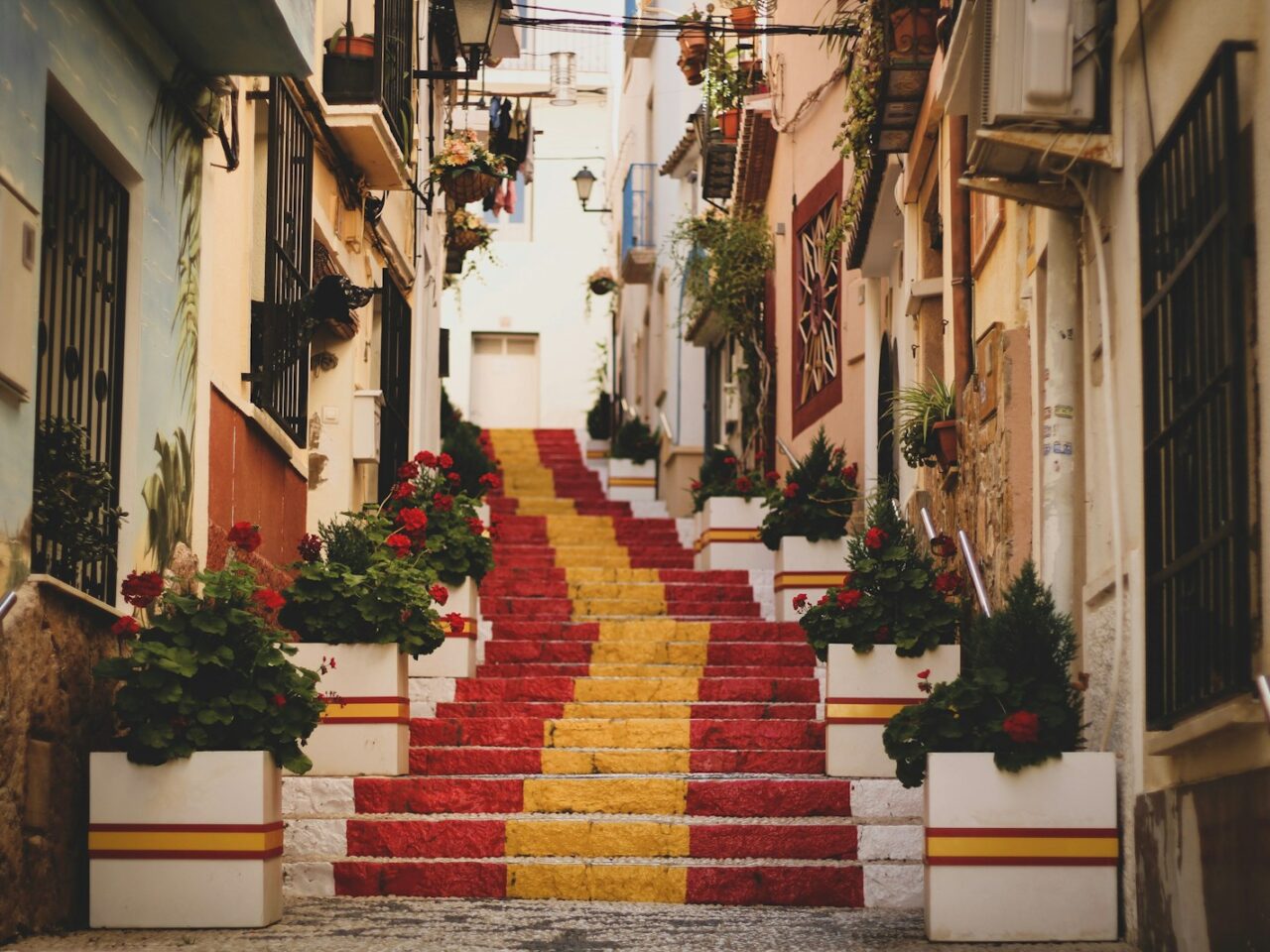 red, yellow, and white concrete stairs
